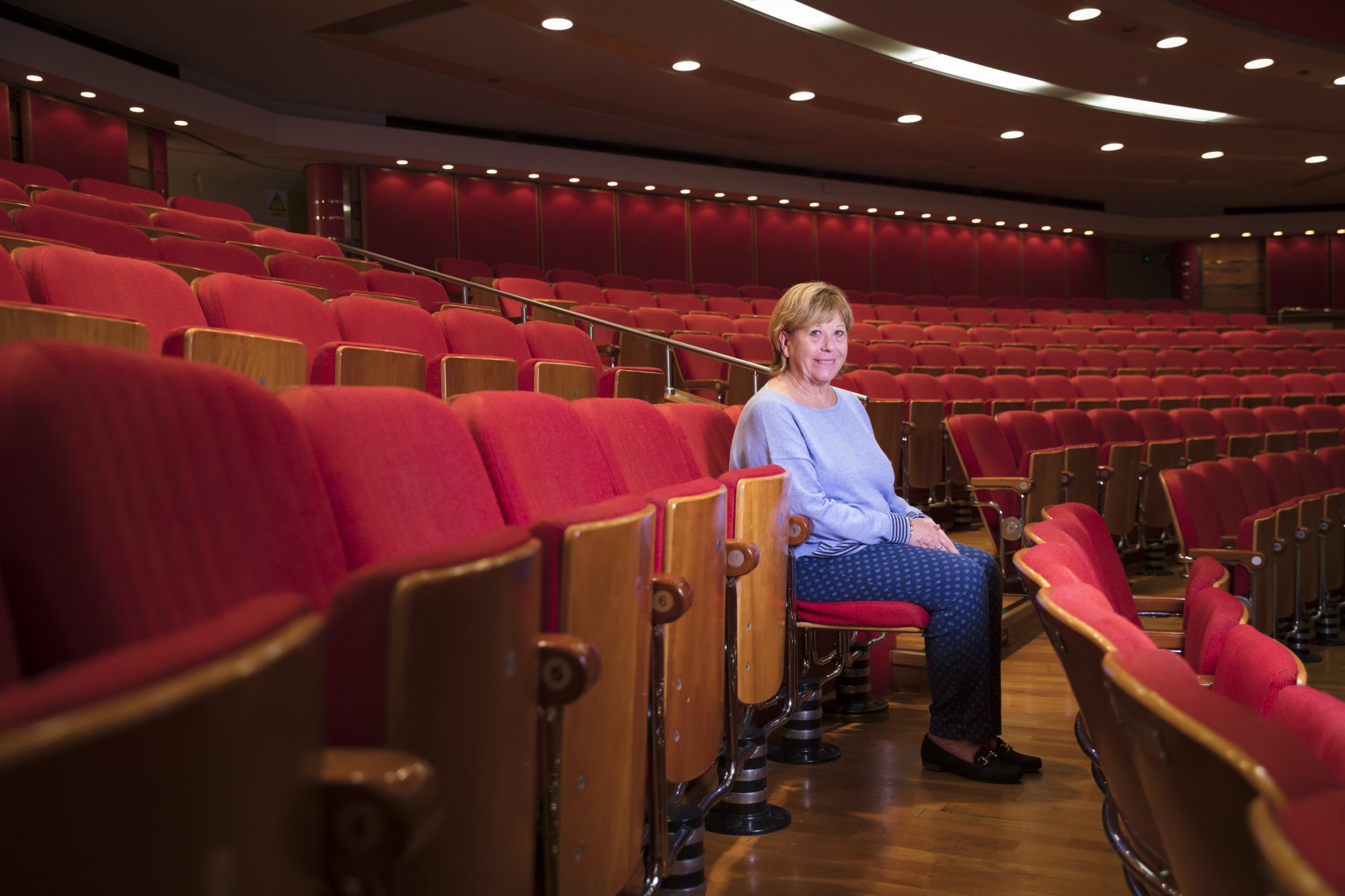 Glenda sitting in Adrian's seat.