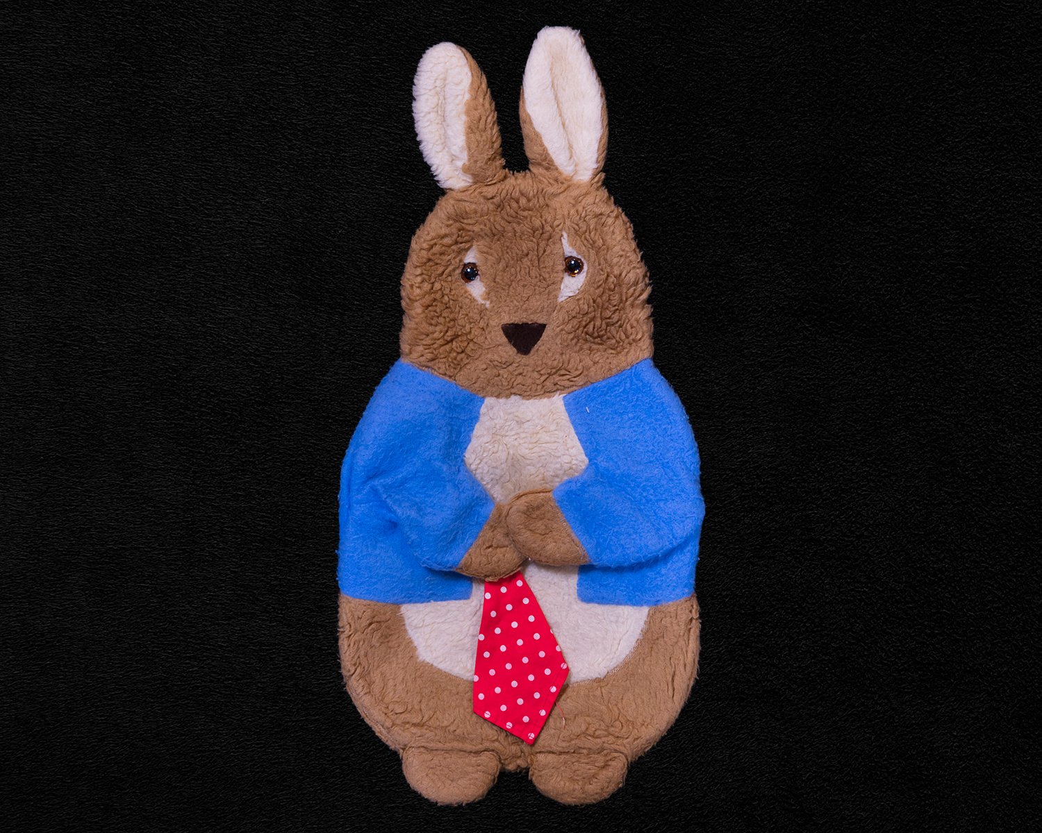 Steve and Andrew hold on to this Peter Rabbit hot-water bottle as a sentimental keepsake.
Mabel would carry this on winter afternoon bus journeys to visit Symphony Hall so it reminds them of the comfort and warmth it brought to their mother.