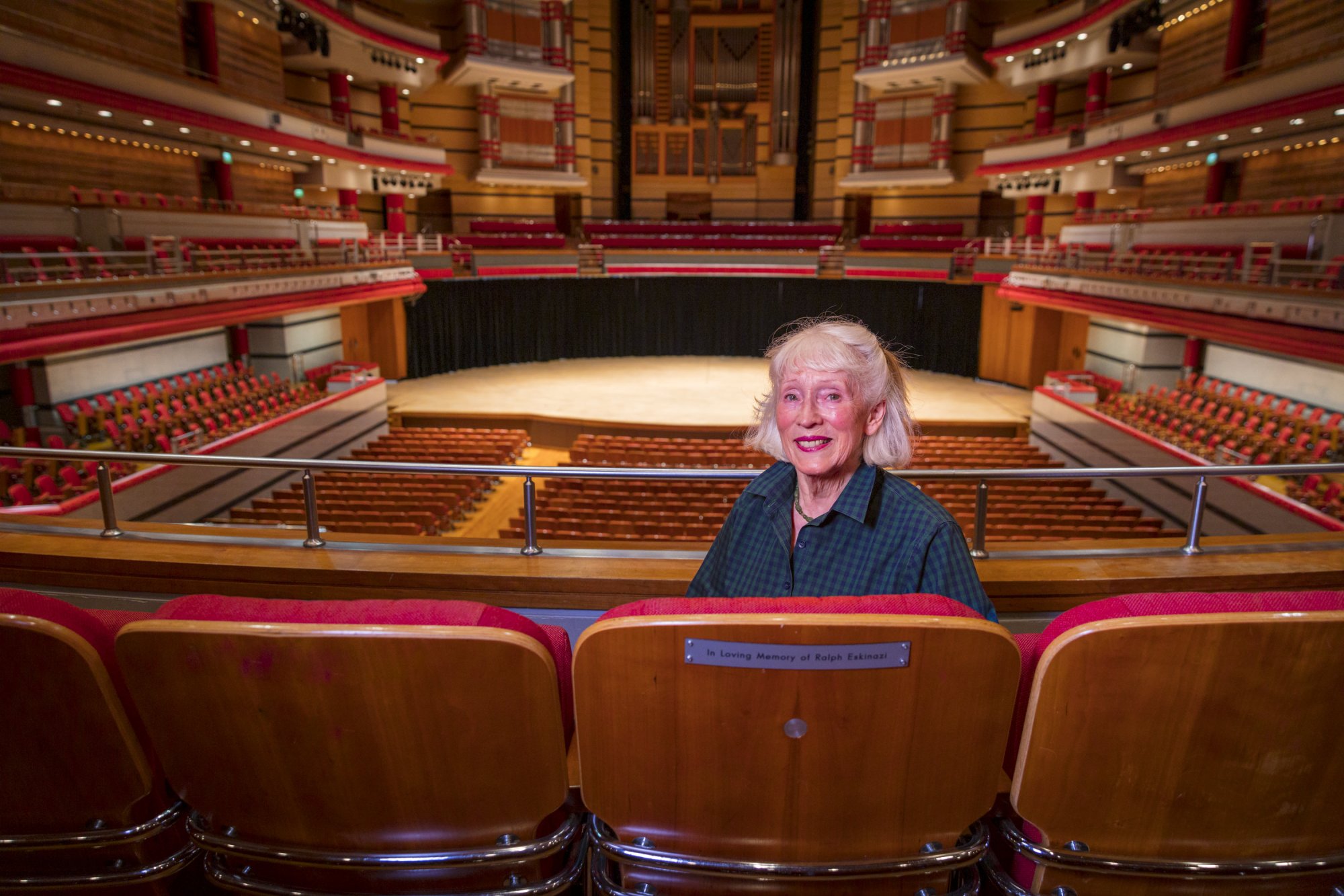 Valerie Eskinazi in the seat she dedicates to her late husband, Ralph Eskinazi.